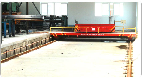 Hydraulic dumping motorized rail