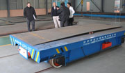 Engineer is explaining rail powered cart