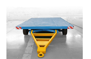 Towed rail trailer for steel mill industry